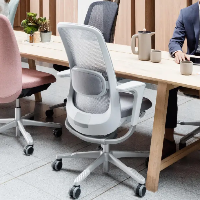 Check out ergonomic office chairs like the HÅG SoFi Mesh 7500 HÅG SoFi Mesh 7500 ergonomic office chair in grey at a desk